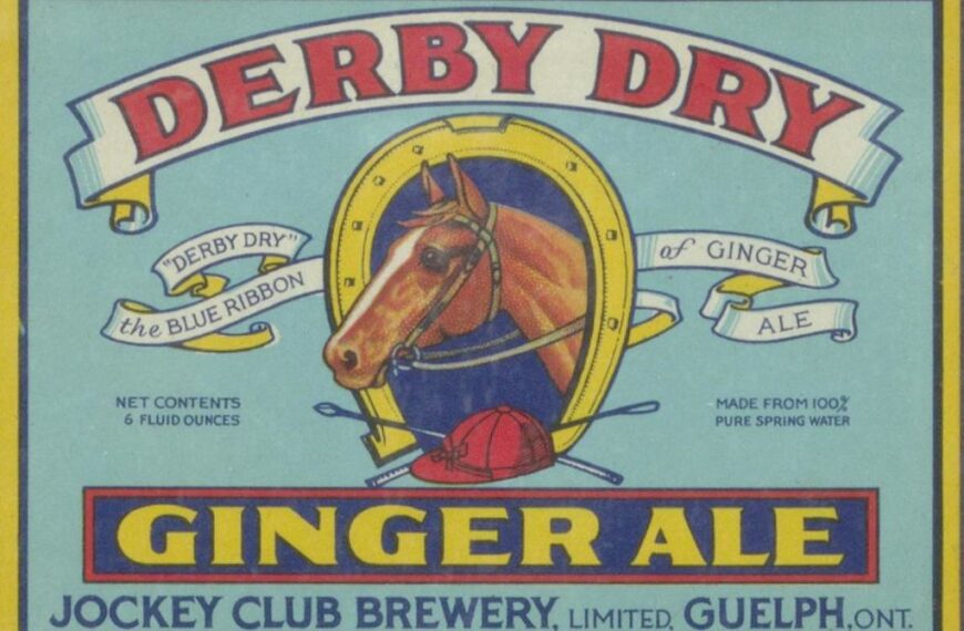 Vintage "Derby Dry Ginger Ale" label featuring a horse's head within a horseshoe, banner text, and product information against a yellow and blue background.